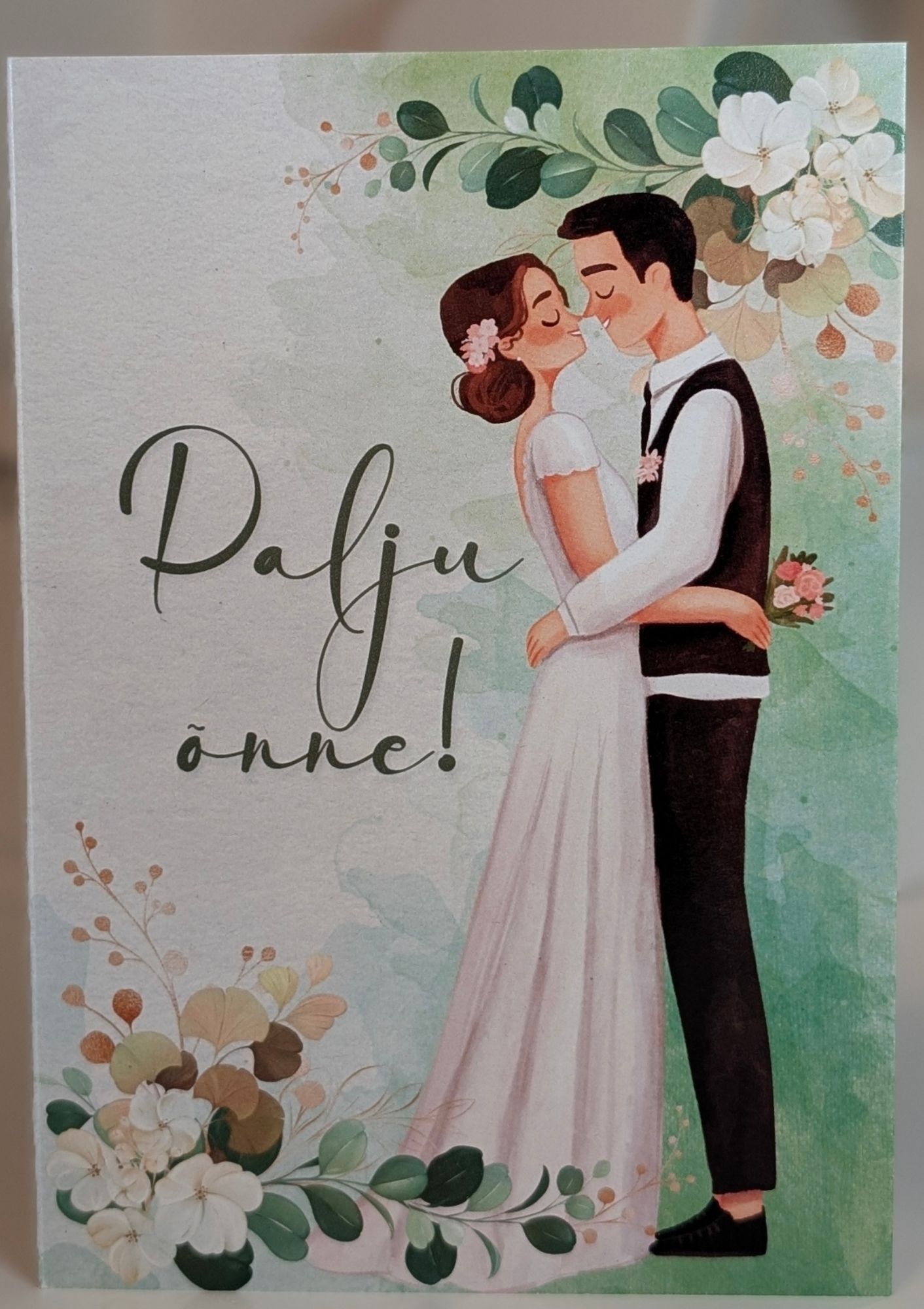 Kutsekunsti elegantne õnnitluskaart pulmadeks lõbusa pruutpaari joonistusega