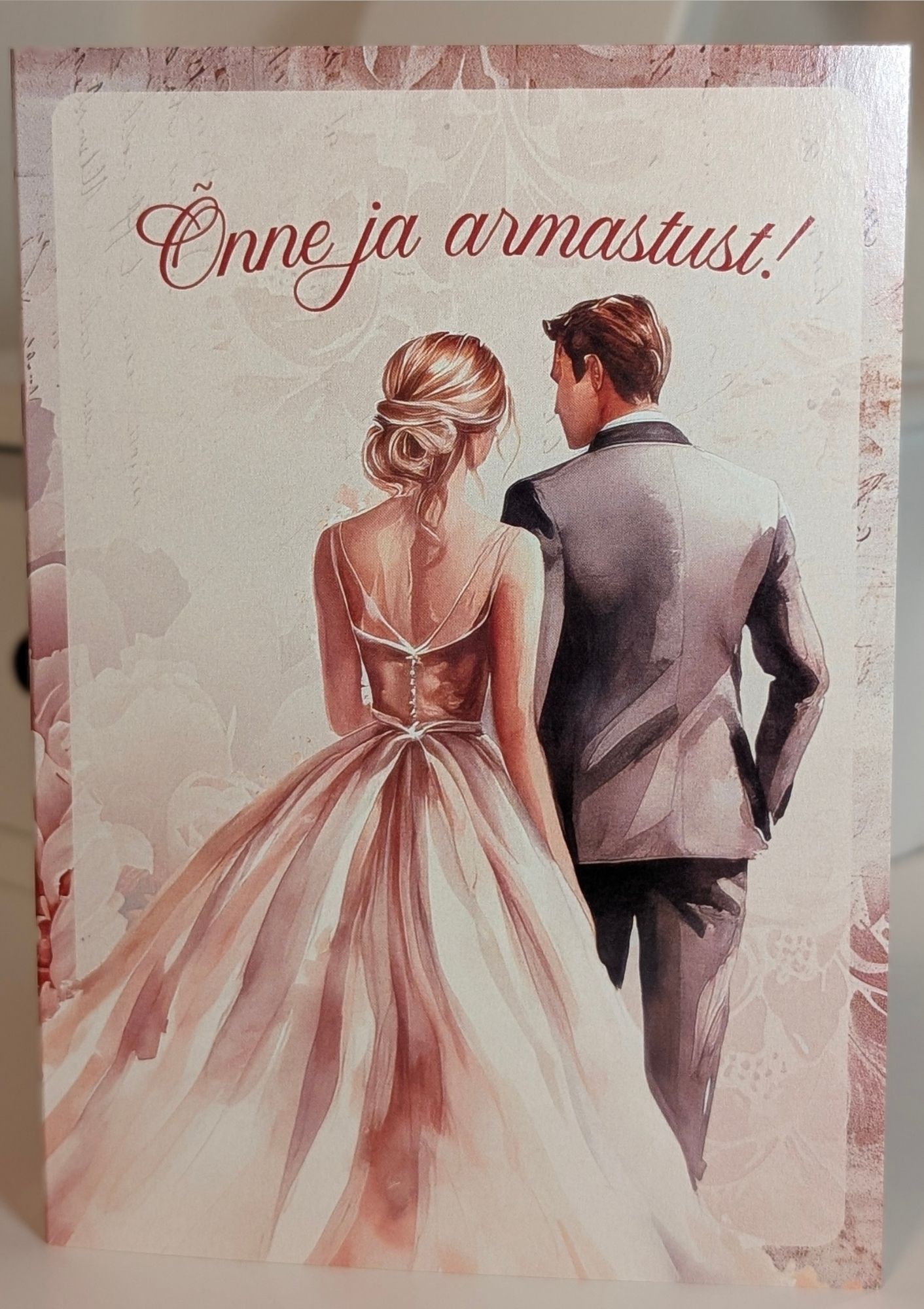 Kutsekunsti lilleline elegantne õnnitluskaart pulmadeks pruutpaari joonistusega